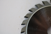 Panel saw adjustable slot saw blade