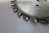 Panel saw adjustable slot saw blade